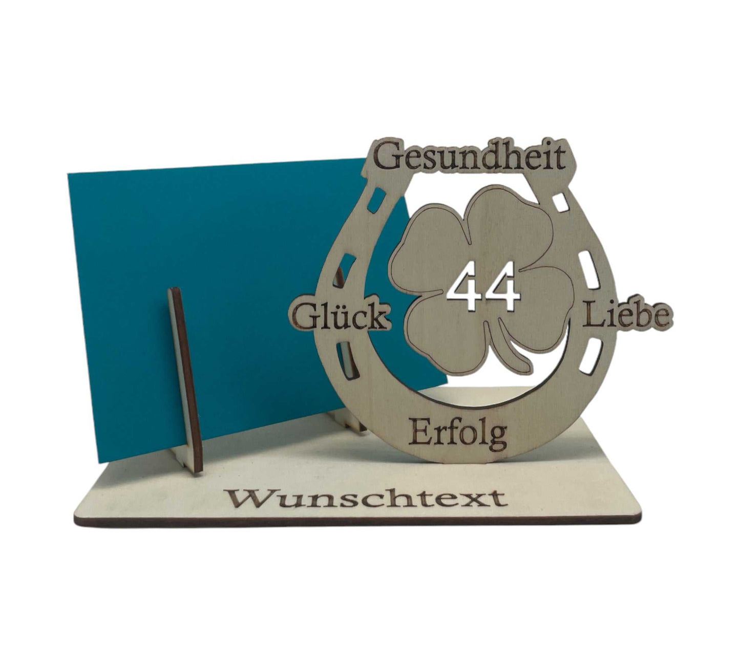 Geldgeschenk stilvoll überreichen – Gutscheinverpackung für den 44.Geburtstag mit Hufeisen und personalisierter Gravur.